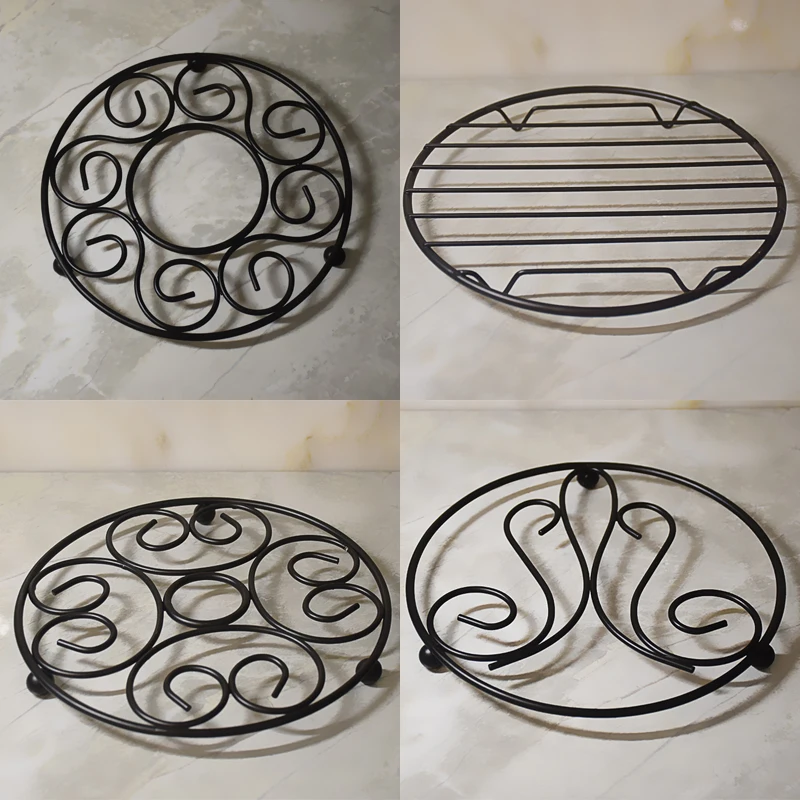 

Wrought Iron Trivet-Victorian Pattern. 7.8" Diameter/Assorted Pattern. Raised Base Protects Your Counters, Tables
