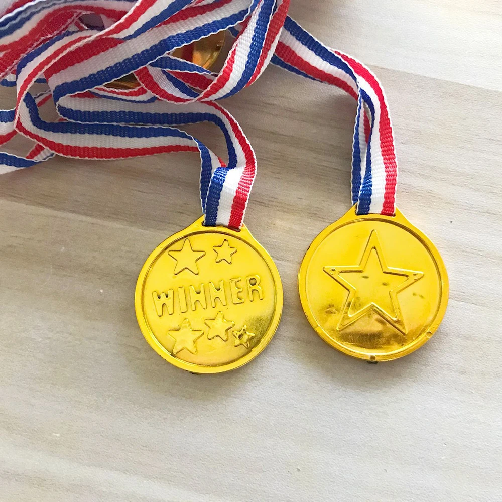 50pcsset children gold plastic winners medals sports day party bag prize awards toys for kids party fun supplies high quality free global shipping