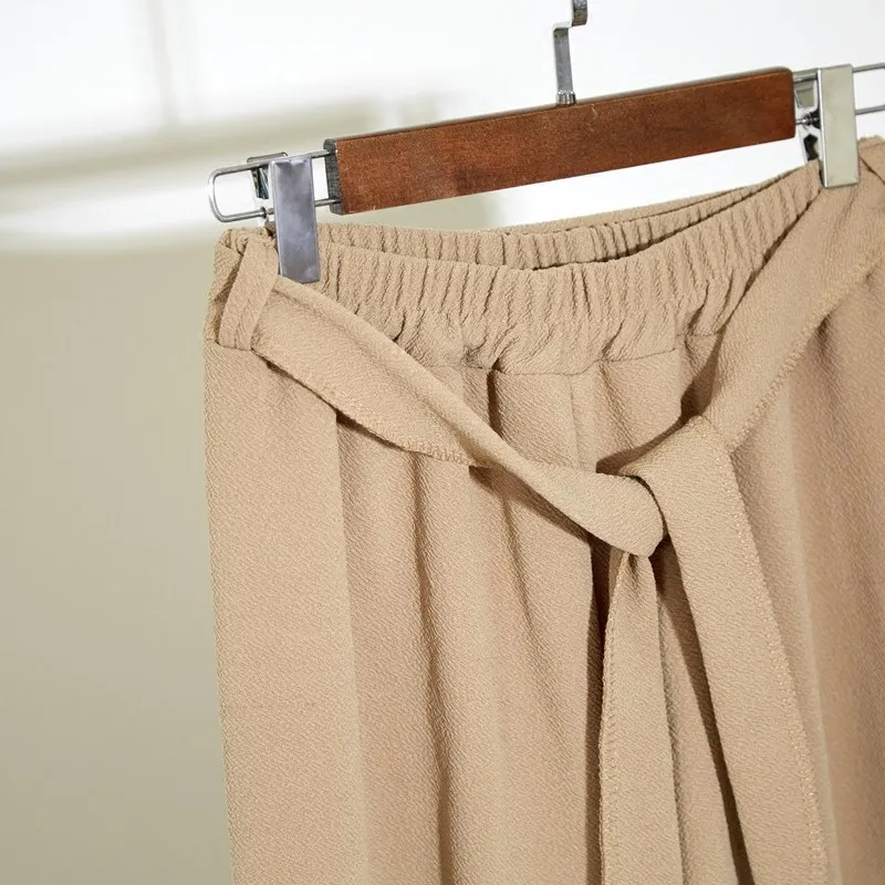 Женские брюки шаровары с высокой талией повседневные однотонные эластичной на