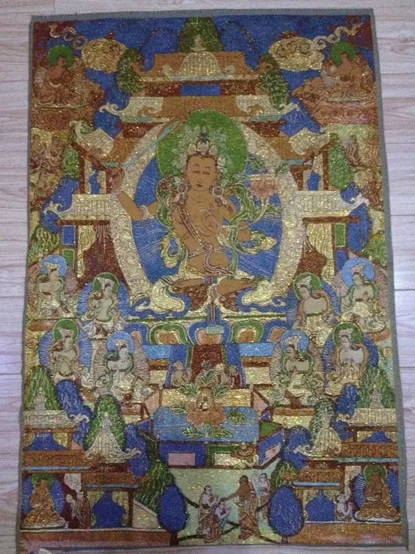

A golden silk embroidery thangka Tibet and Nepal exorcism peace and wealth
