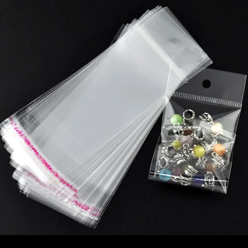 5000Pcs Display Package Self Adhesive Seal Plastic Bags With Hang Hole Transparent For Jewelry Finding14x5cm (Usable 9x5cm)
