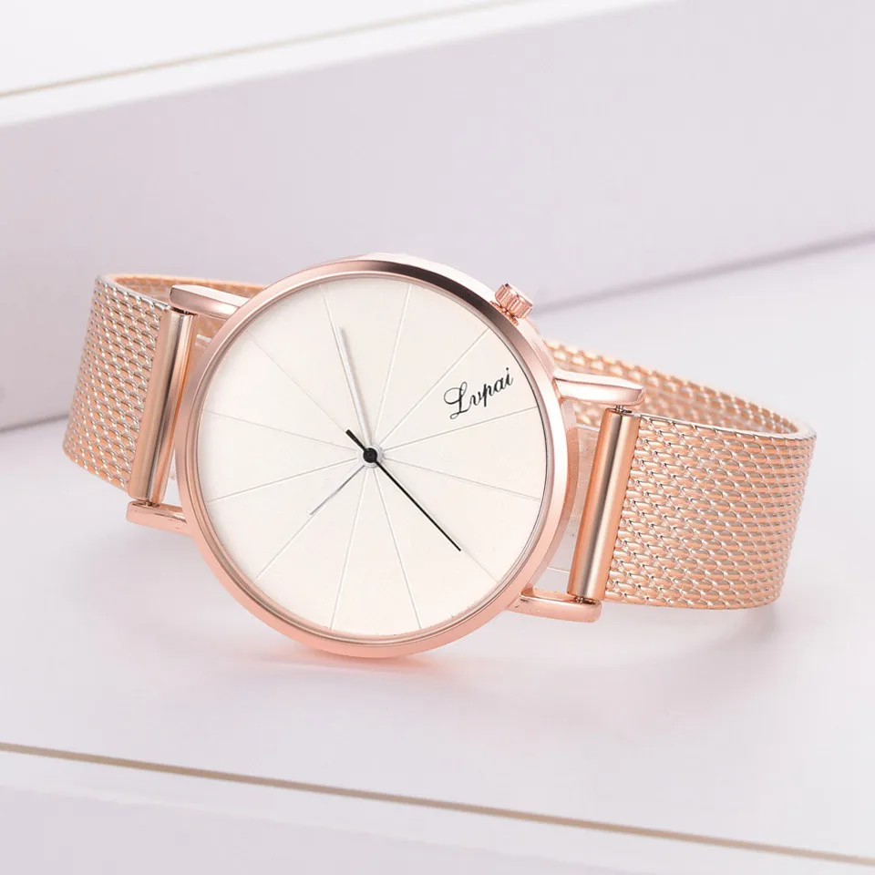 Часы наручные женские кварцевые под розовое золото с силиконовым ремешком |