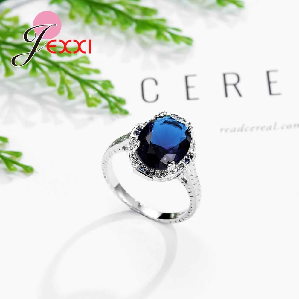 Свадебные аксессуары кольцо с синим камнем и кристаллами овальный вырез