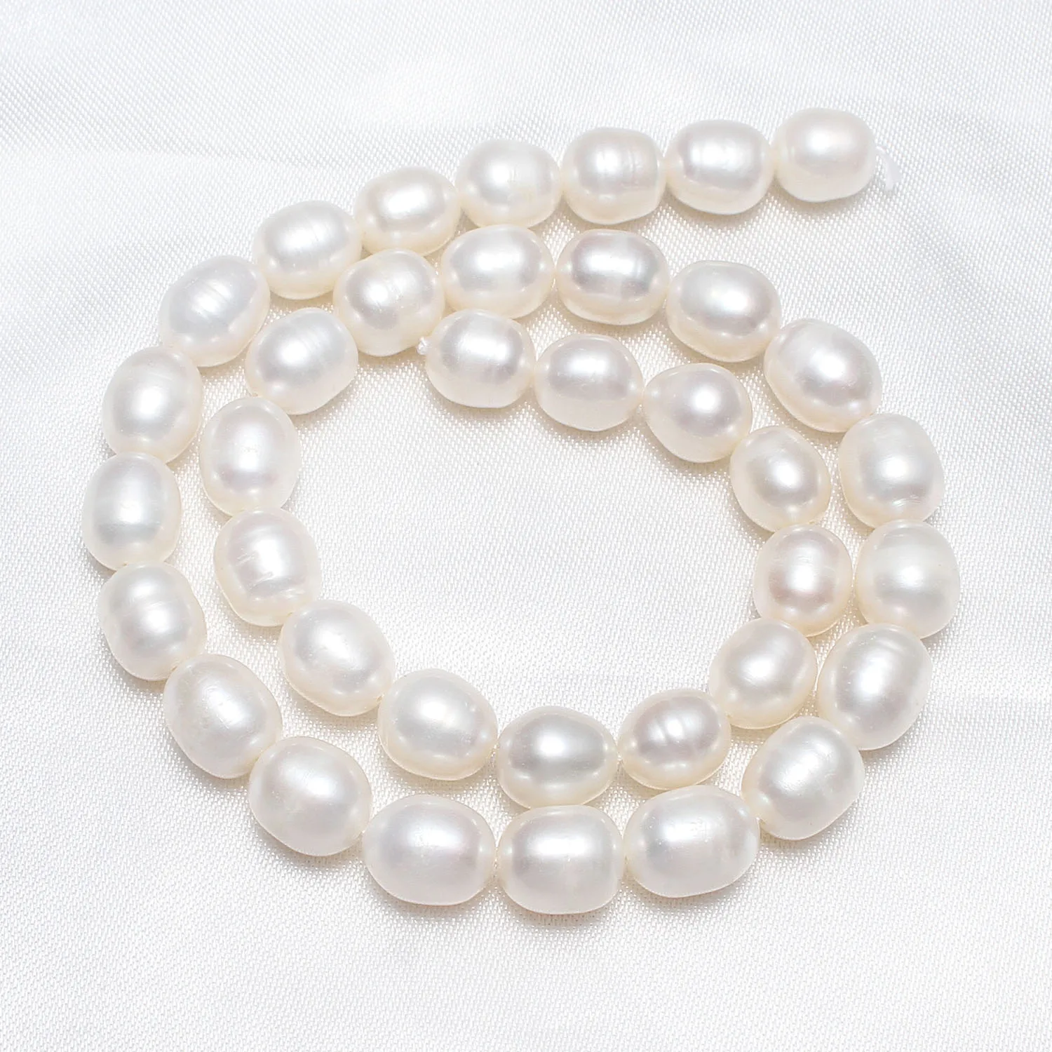 

AAA Cultured Rice Freshwater Pearl Beads Natural White 9-10mm Approx 0.8mm Sold Per Approx 15 Inch Strand
