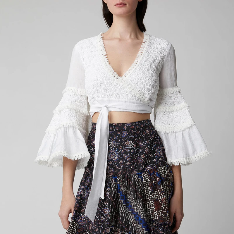 TWOTWINSTYLE Элегантный кисточкой лоскутное женский костюм V образным вырезом расклешенный бандажный укороченный топ Высокая талия узкая юбка средней длины комплект из двух предметов женский