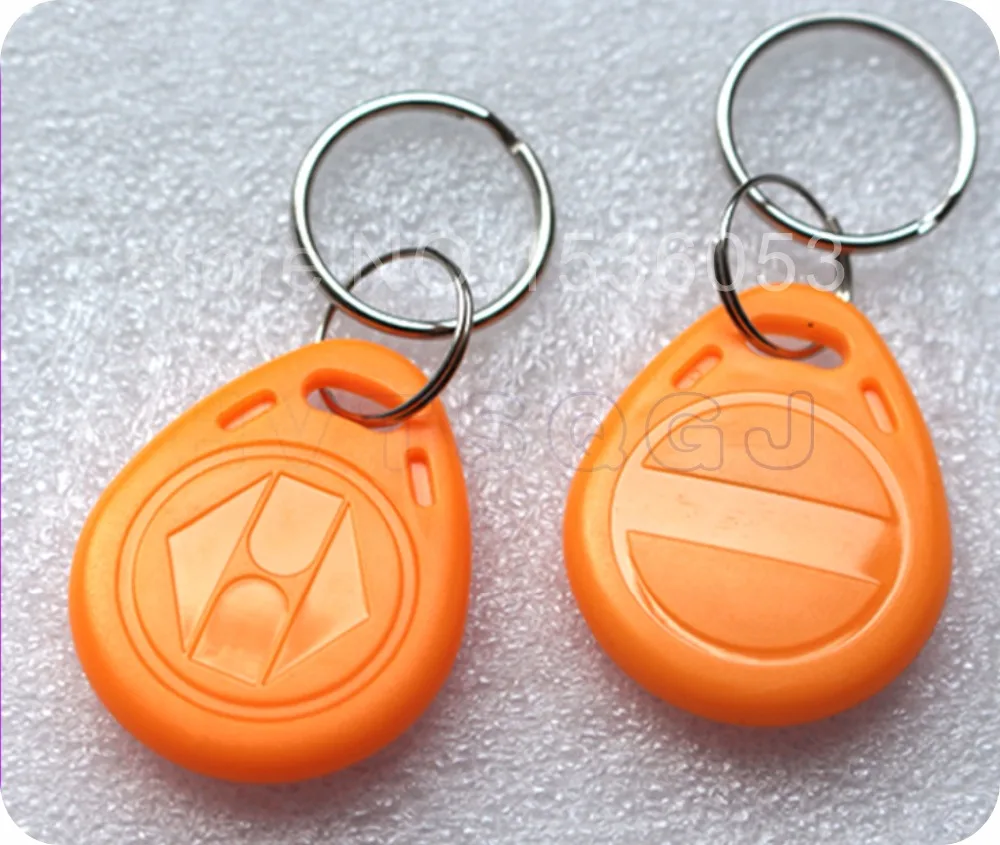 (100PCS) Top Quality 6 Different Color TK4100(EM4100) 125KHz Waterproof RFID Tag NO.2 ID Keyfob Keychain For Access control |