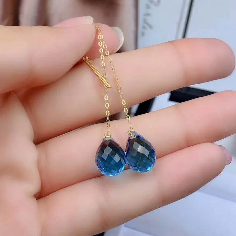 Классические серьги подвески с темно синим топазом из 18 каратного желтого золота