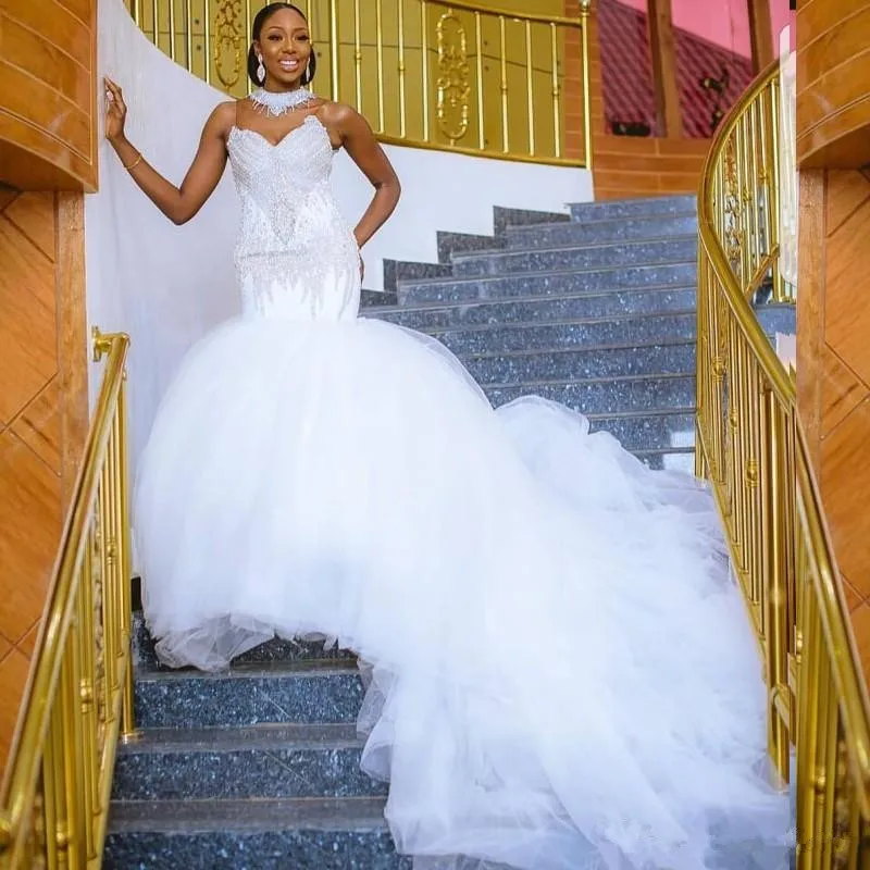 

Stunning High Neck Mermaid Wedding Dresses Crystal Beads Sequins Fluffy Train Wedding Gowns Sexy Plus Size African Sleeveless