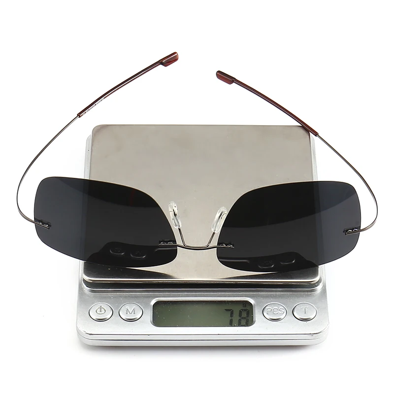 Мужские солнцезащитные очки без оправы поляризационные из чистого титана легкие