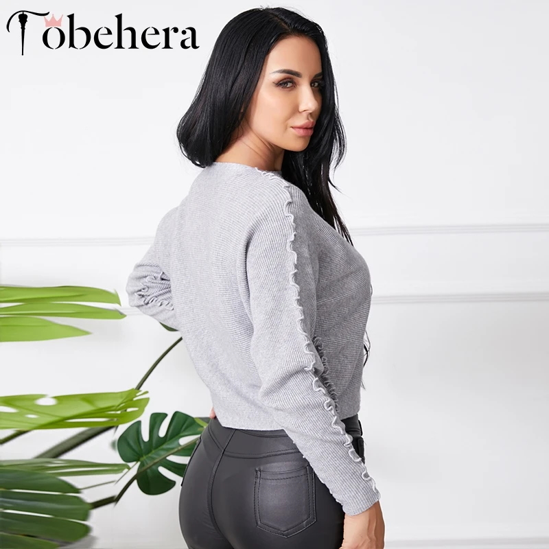 Женский трикотажный свитер Glamaker серый с волнистым люрексом и рукавом летучая