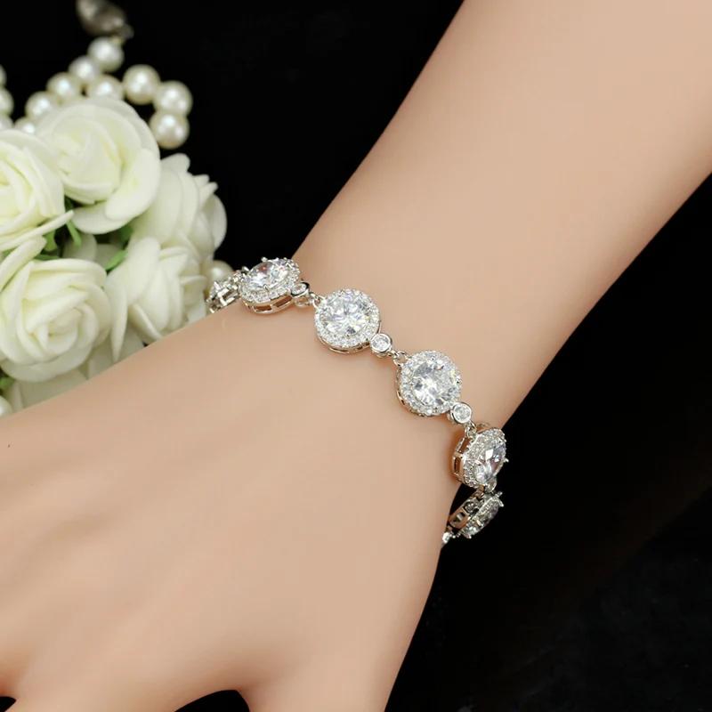 

ThreeGraces Sparkling White Cubiz Zirconia Crystal Elegant Round Dinner Party Tennis Bracelets Bangles for Women Gift BR128