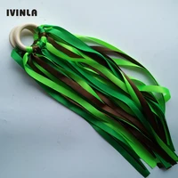 20pcslot green color stain ribbon wooden ring waldorf ribbon with bell hand kite toy fly me birthday party favors