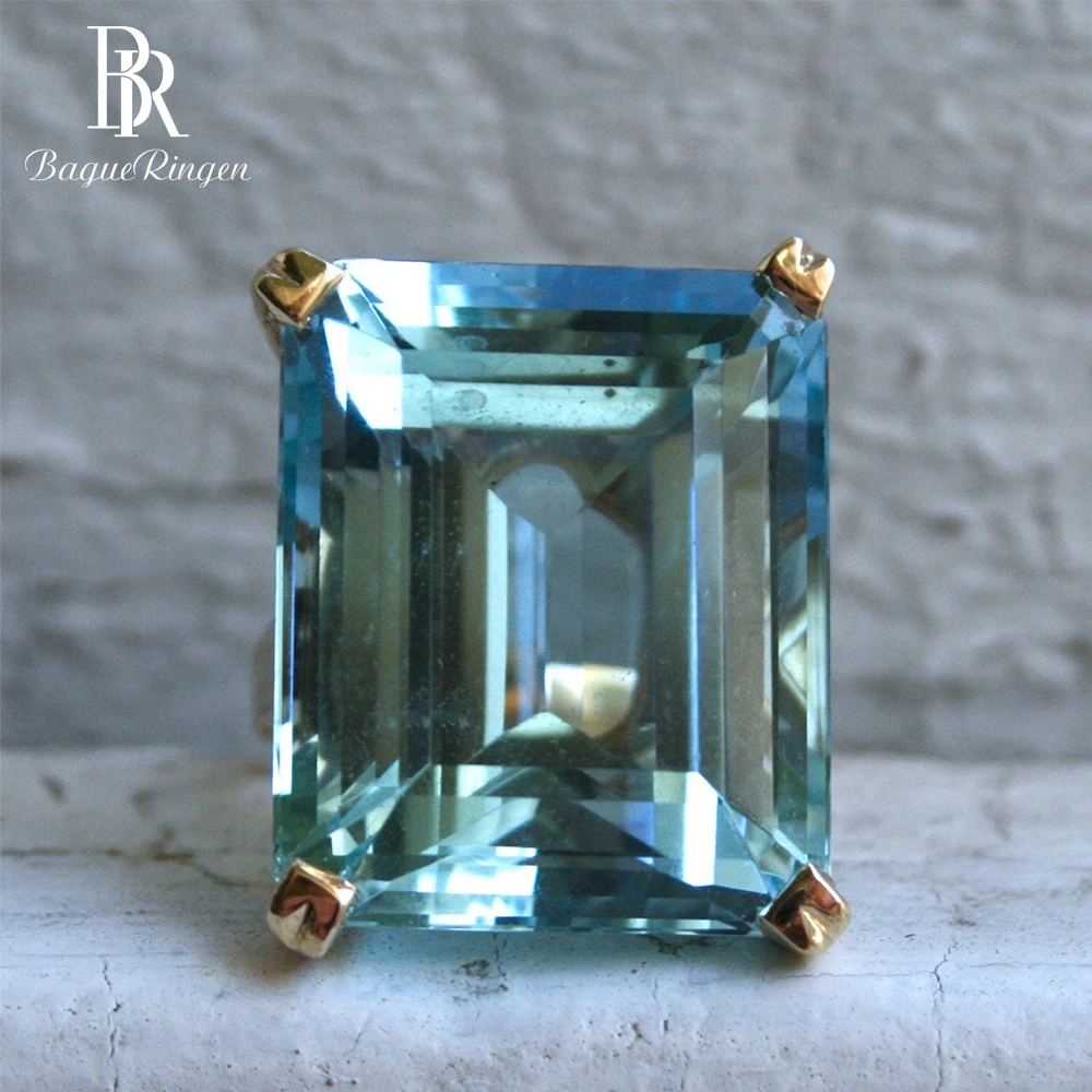 Женское кольцо с большим камнем Bague Ringen золотистого/синего цвета Ювелирное