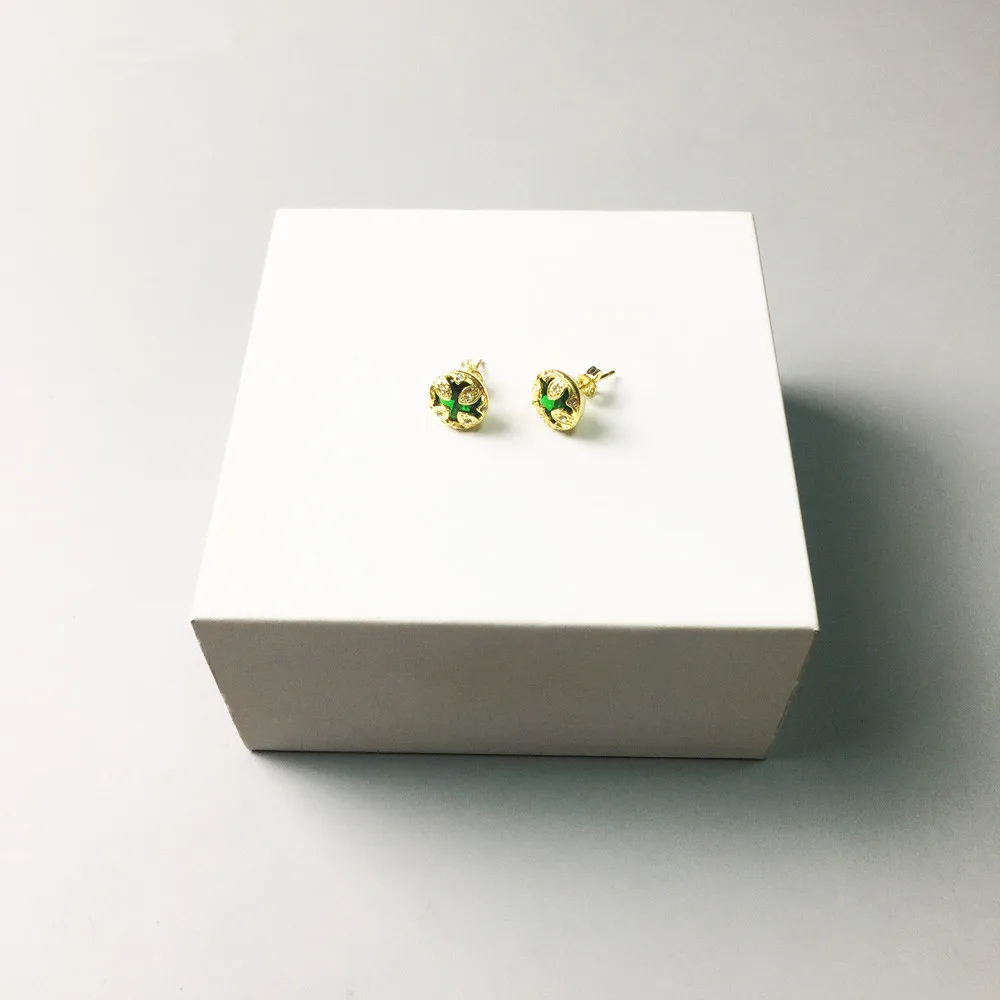 Золотые серьги гвоздики с белым цирконием зеленые кварцевые в форме лотоса