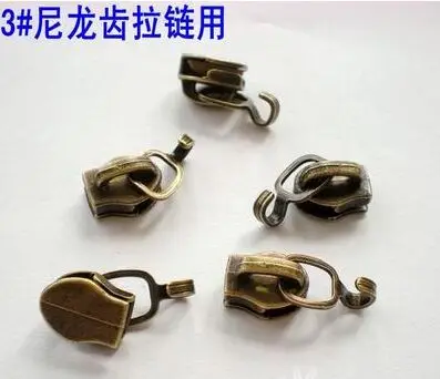 

Free shipping 100pcs/lot 3# bronze nylon zipper head zipper slider zipper pull head automatically luggage zipper head