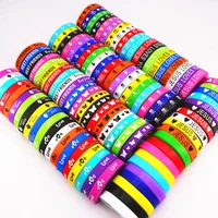 pack of 100pcs multicolor elasticity jesus cross skull peace butterfly etc style wrist cuff silicone bracelets for man women
