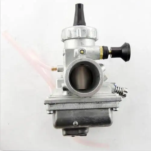 

Mikuni VM24 Roundslide Carburetor. Measures 28mm at intake manifold. Uses 40mm rubber boot intake.