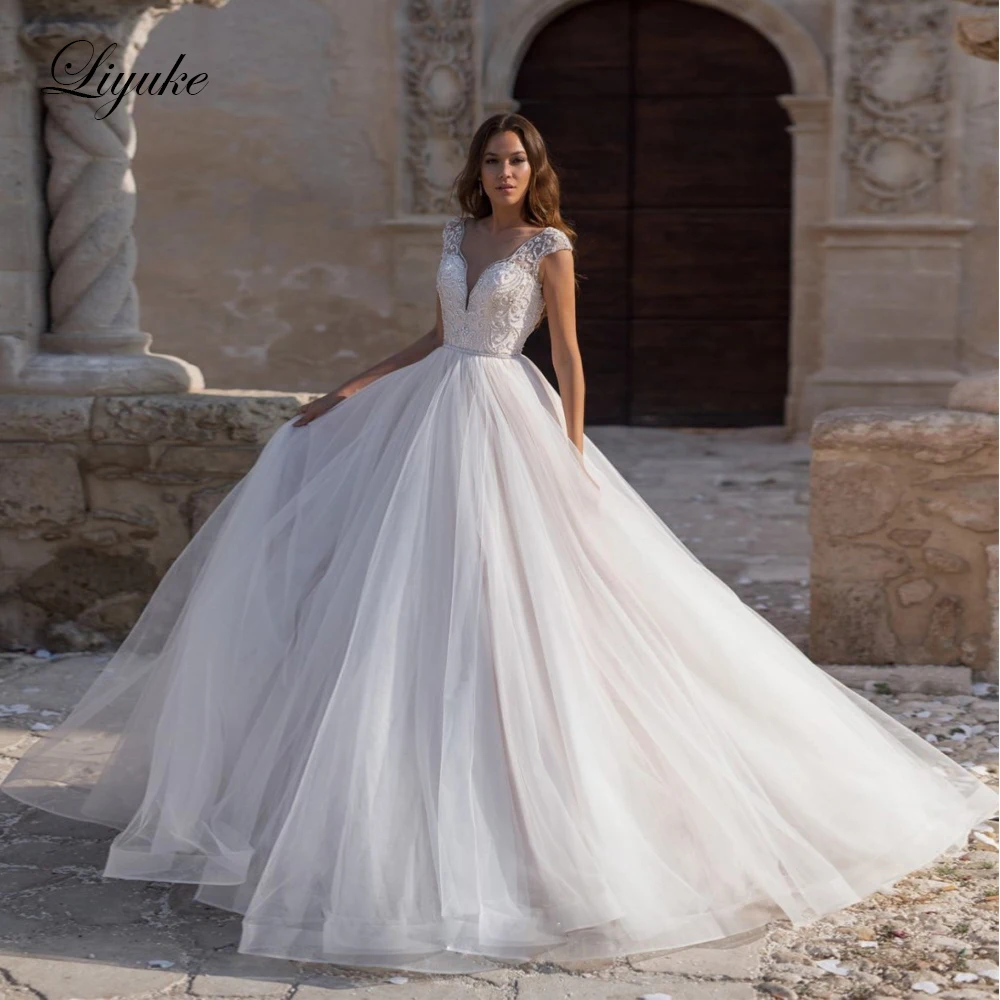 

Liyuke Embroidery Bust Beading A-Line Wedding Dress Princess Short Sleeve Wedding Gown With Buttons Closure