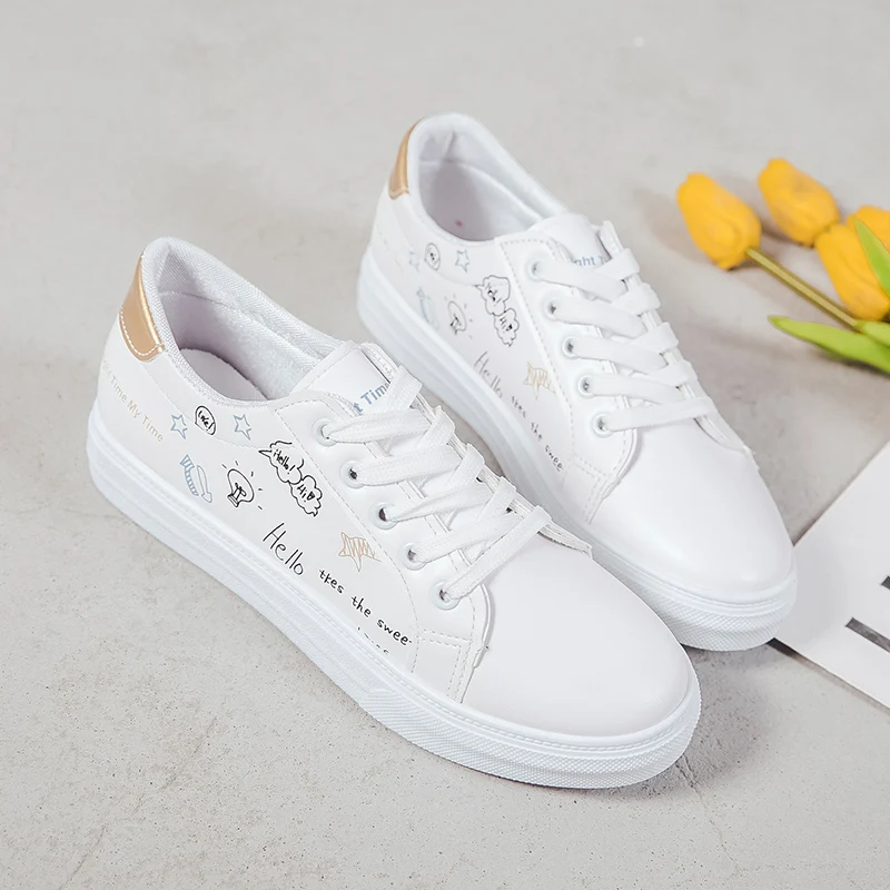 Женская теннисная обувь на шнуровке однотонная Белая из искусственной кожи