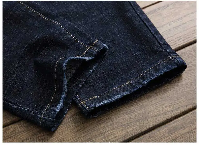 

Men Fashion Denim Jeans Ripped Hole Knees Jeans Fashion Rivet Design Casual Slim Fit Denim Beggar Pants Brand Long Trousers