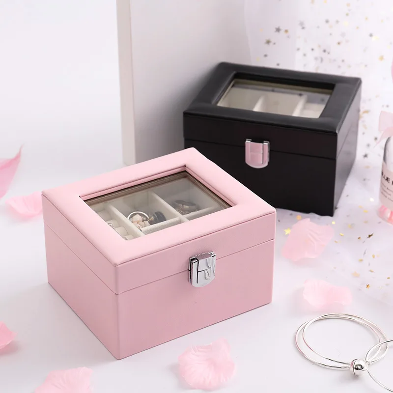 Женский подарок - простая кожаная многофункциональная коробка для хранения украшений с прозрачной крышкой и двумя ярусами.