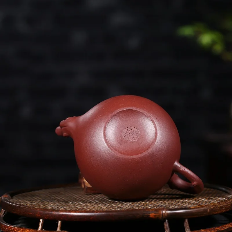 

Yixing recommended manufacturers wholesale craftsmen Shao Meihua all hand teapot squirrel dark purple clay teapot
