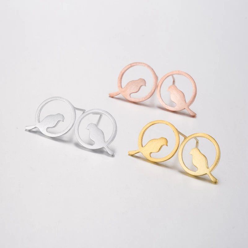 Женские серьги-гвоздики в виде ветки птицы |