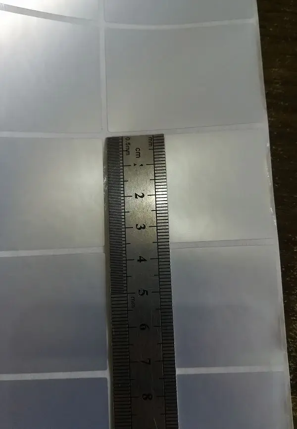 Термопереводные этикетки герметичные клеящиеся бумажные бирки 50x35x2500