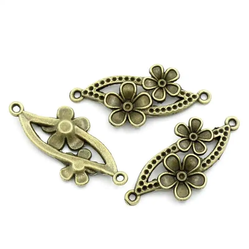 Коннекторы DoreenBeads античные бронзовые наклейки с цветами и стразами ss1 3 7x15 мм 5 шт. |