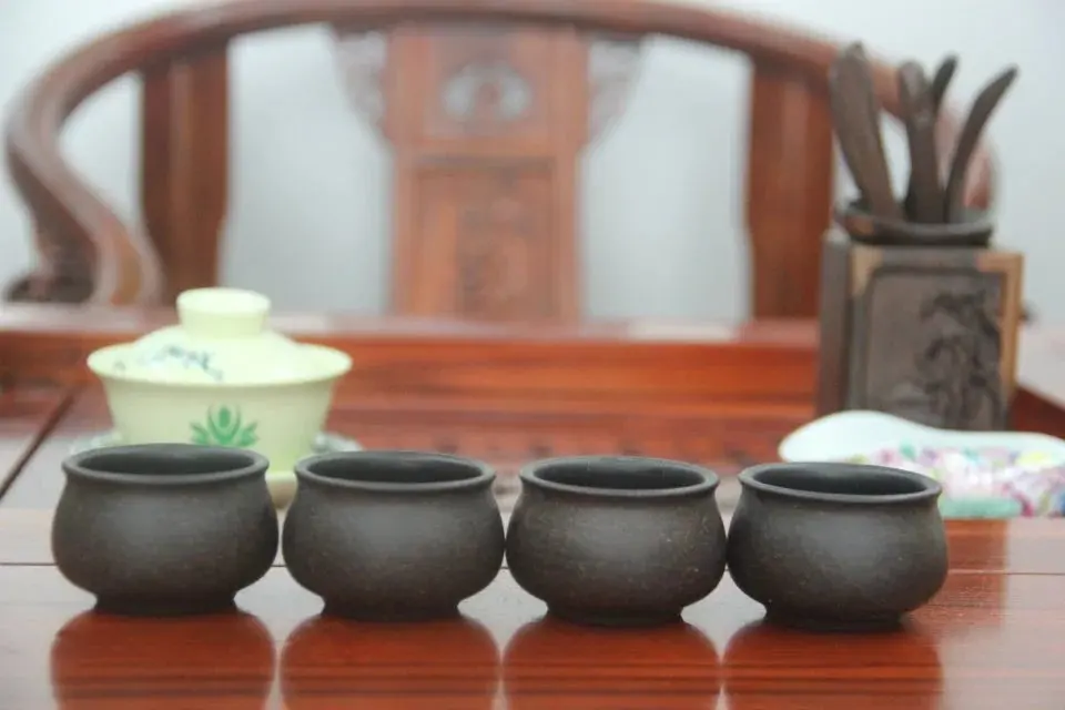 Чайная чашка из фиолетовой глины yi xing чайная черной King Kong Zhu маленькая с храмом