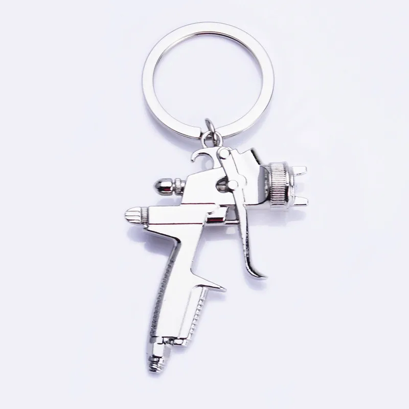 Water Spray Gun Keychain Metal Men Gift Car Key Chain Motorcycle Auto Accessories Creative Key Ring Water gun Key Cover Holder