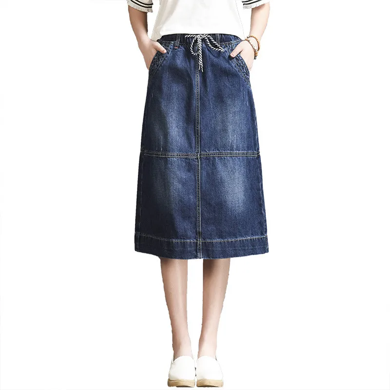 Женская джинсовая юбка на шнуровке синяя средней длины с высокой талией и