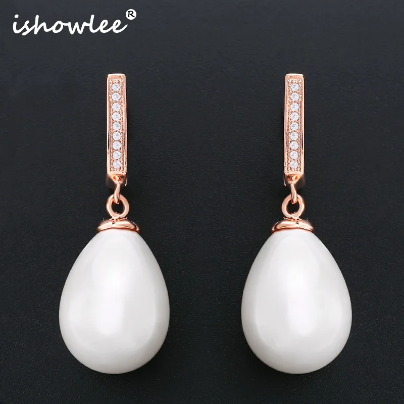 Женские серьги с жемчугом и цирконом розовое золото 585 пробы | Украшения