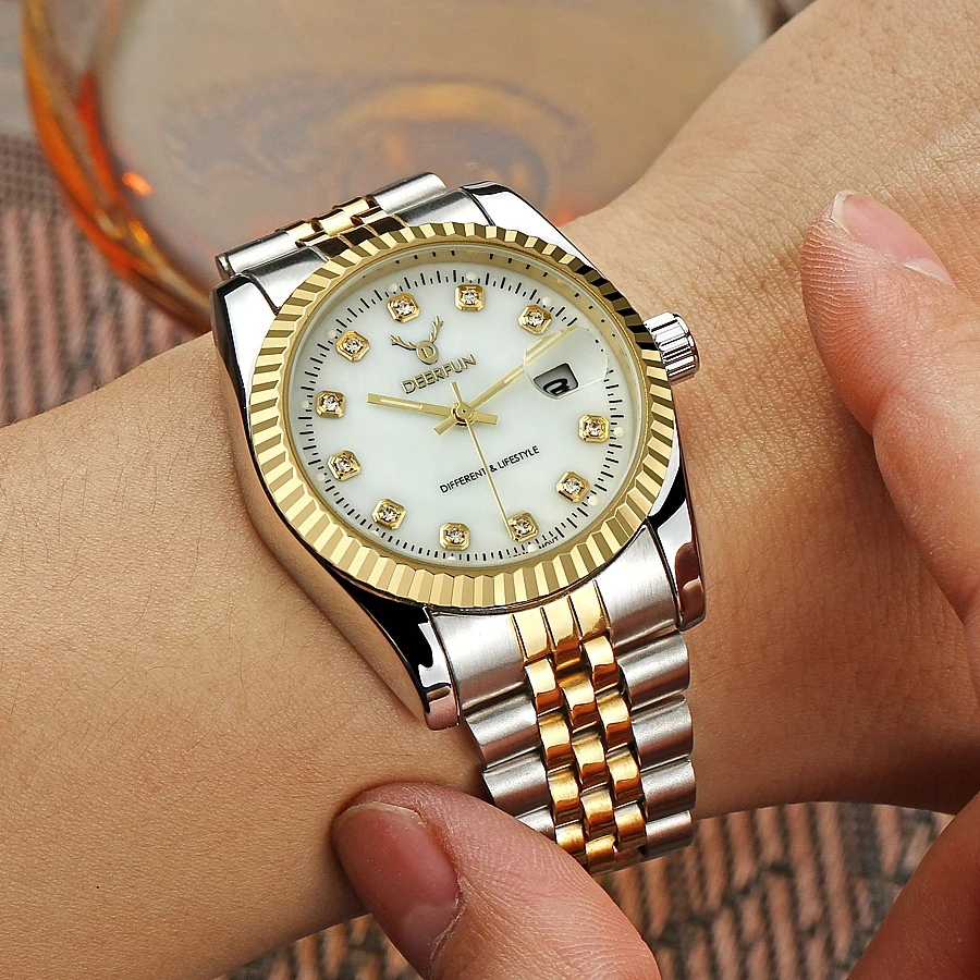 Часы наручные мужские и женские кварцевые золотистые с вращающейся рамкой