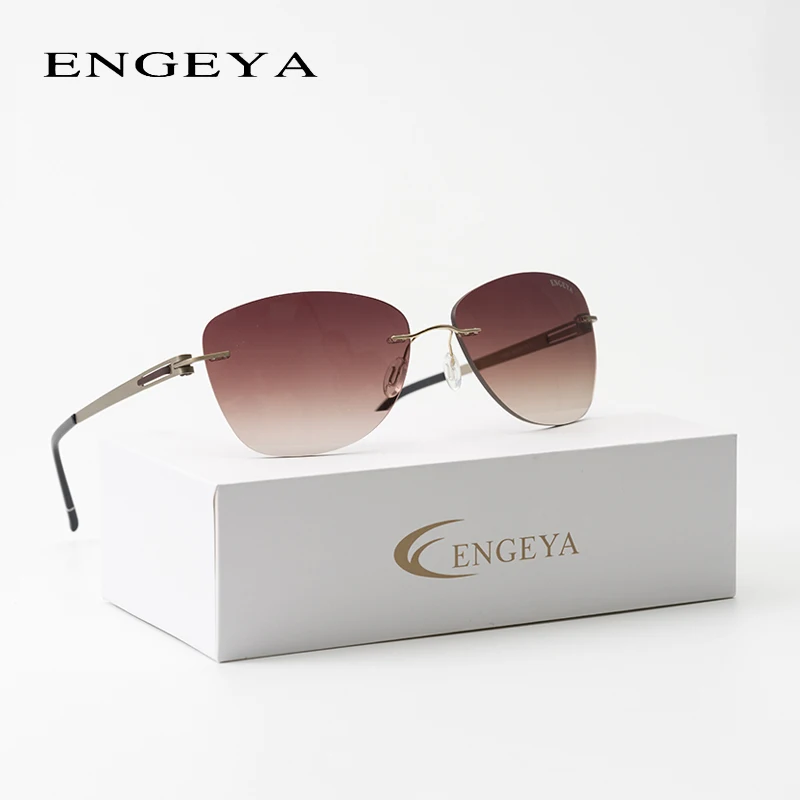 

2018 ENGEYA New Fashion Super Light Stainless Steel Brand Designer Rimless Sunglasses Women Driving Sun glasses UV400 T11006