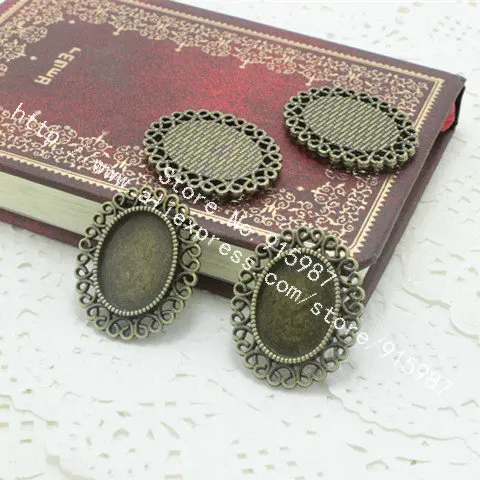 

Sweet Bell 20pcs/lot Antique Bronze 13*18mm Oval Filigree Cameo Cabochon Settings Diy Photo Jewelry 7A1125