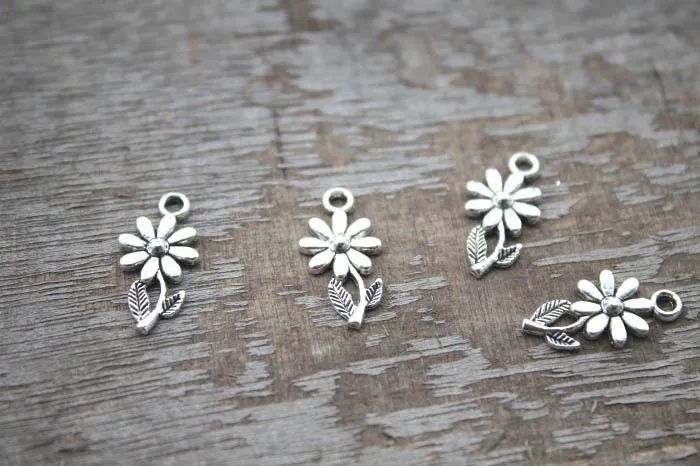 

100pcs mini SUNflower charms silver tone mini sunflower charms pendants 10x19mm