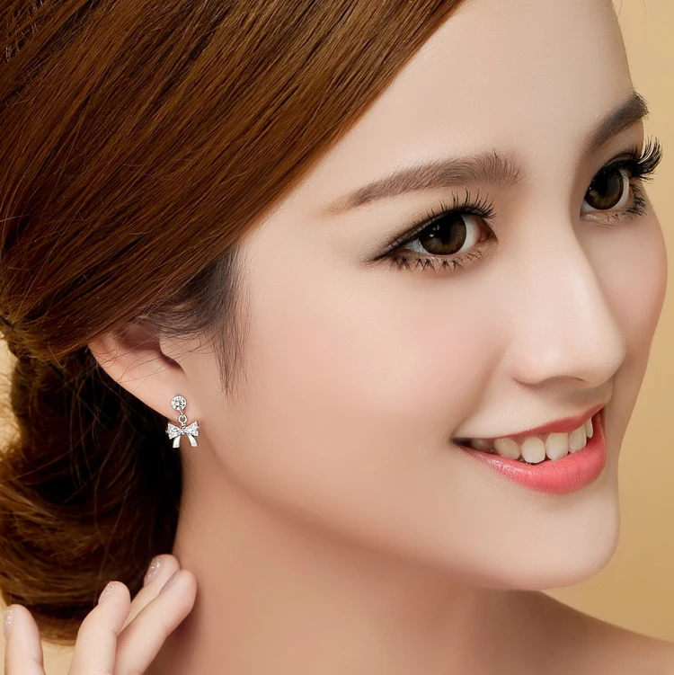 Женские посеребренные серьги-гвоздики с бантом Y | Украшения и аксессуары