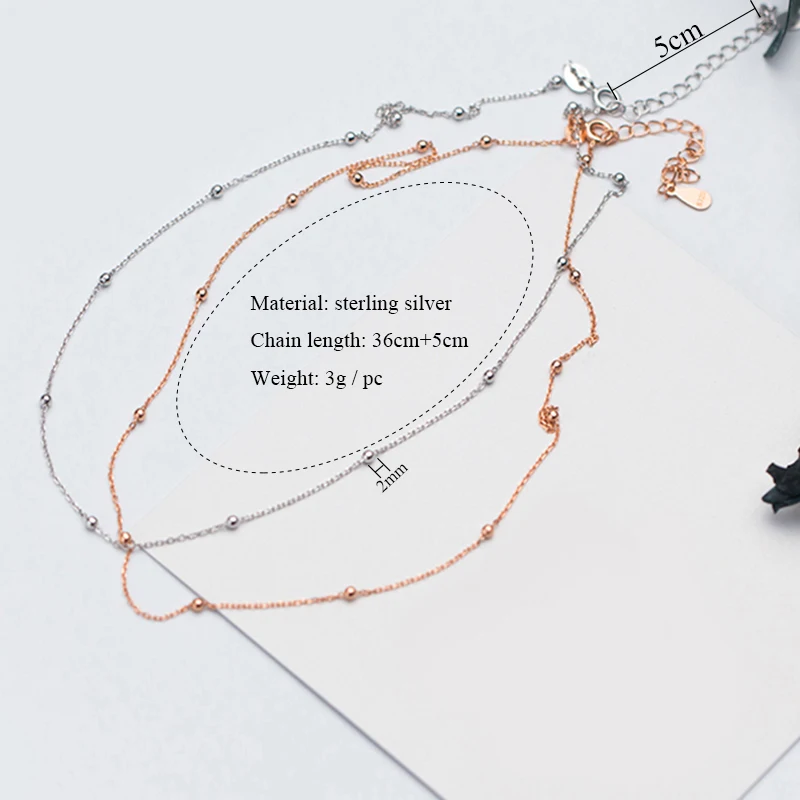 Женское минималистичное колье чокер с бусинами из серебра и розового золота