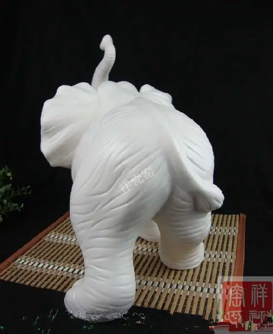 

Dehua white porcelain Chinese auspicious animal elephant statue of peace