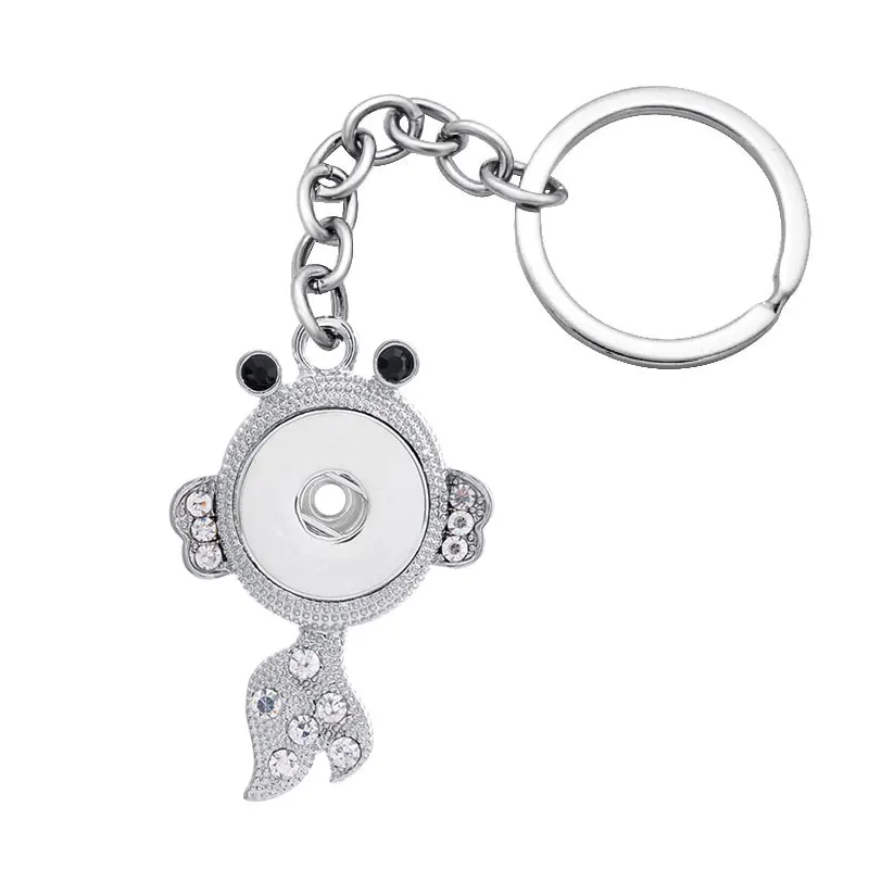 Модные трендовые брелки с рыбками бабочками лебедем дельфином кристаллами