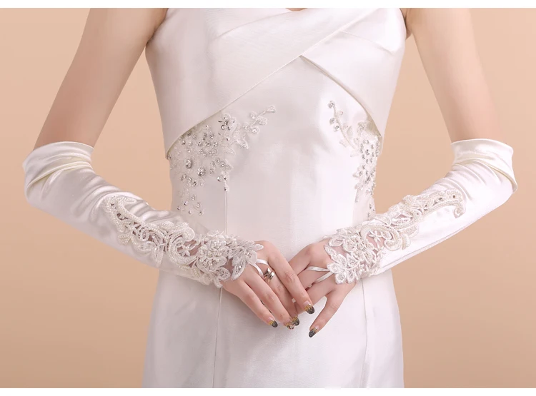 Фото Бесплатная доставка Новые белые длинные кружевные свадебные перчатки платья