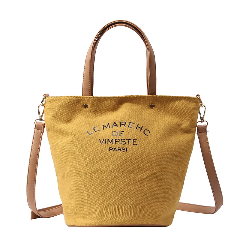 

mylb Ins hot style new women's handbag canvas letters single shoulder bag artistic minimalism bucket canvas bag shopping bag