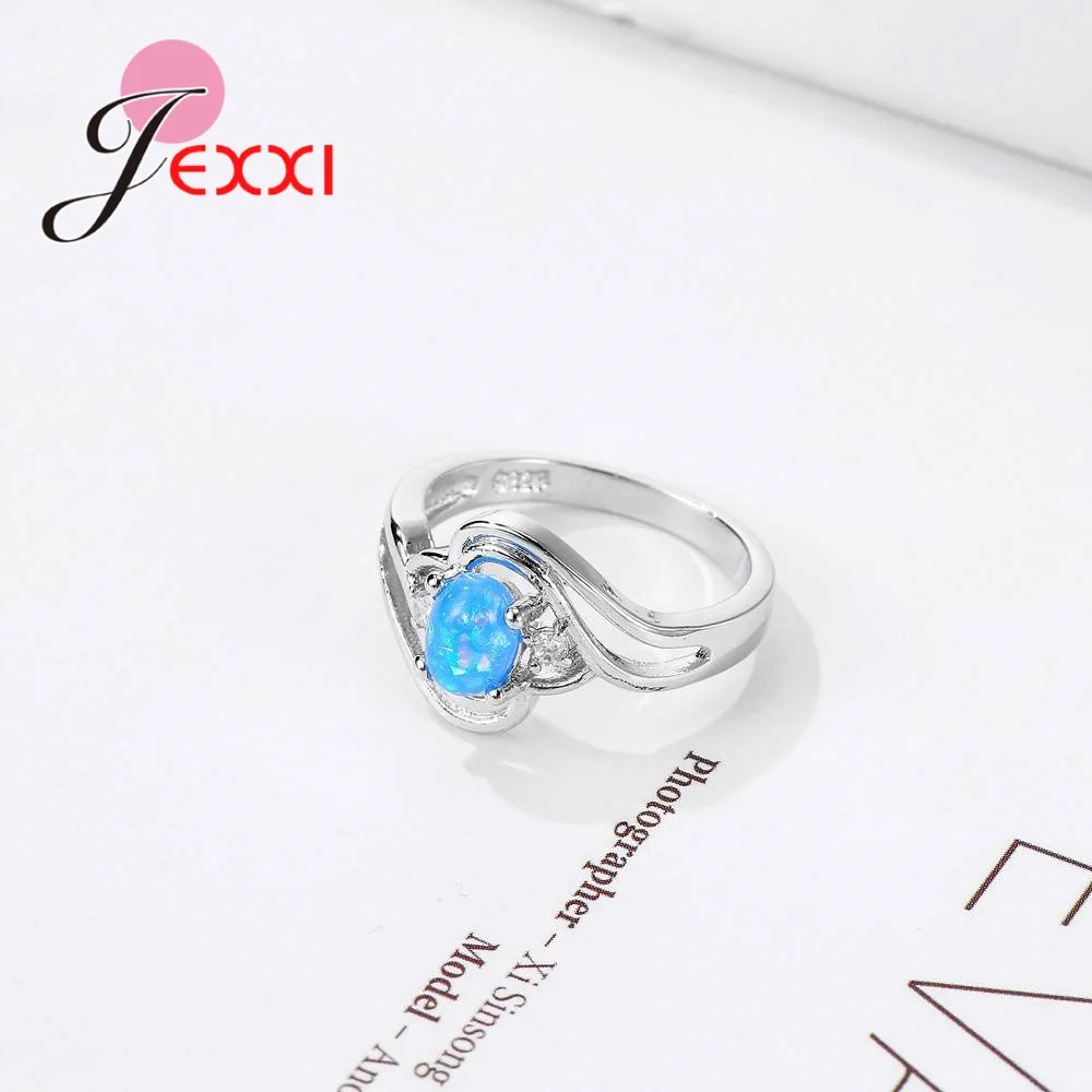 Спиральные мистические овальные камни из синего опала обручальные кольца