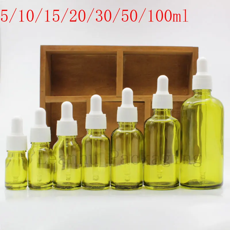 Зеленая бутылка эфирного масла со стеклянной капельницей пустые косметические