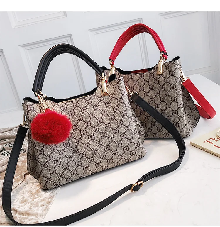 Wide shoulder strap bucket bag portable handbag 2019 new female Korean version of the autumn wild print Messenger |