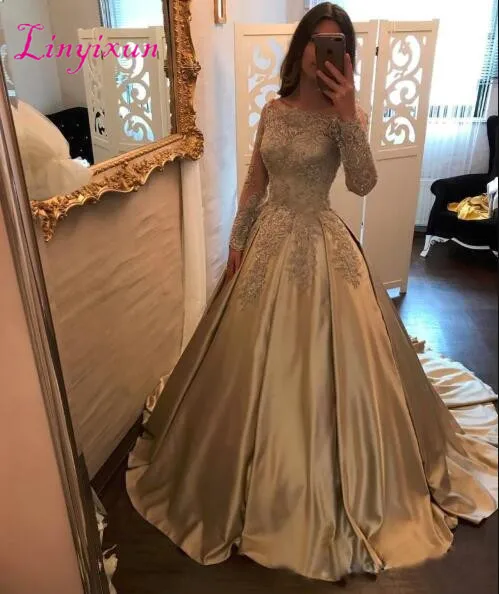 

2018 Gold Ball Gown Prom Dresses Bateau Neck Off Shoulder Long Sleeves Appliques Beaded Satin Evening Gowns