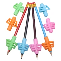 children writing pencil pen holder kids learning practise silicone pen aid posture correction device for students
