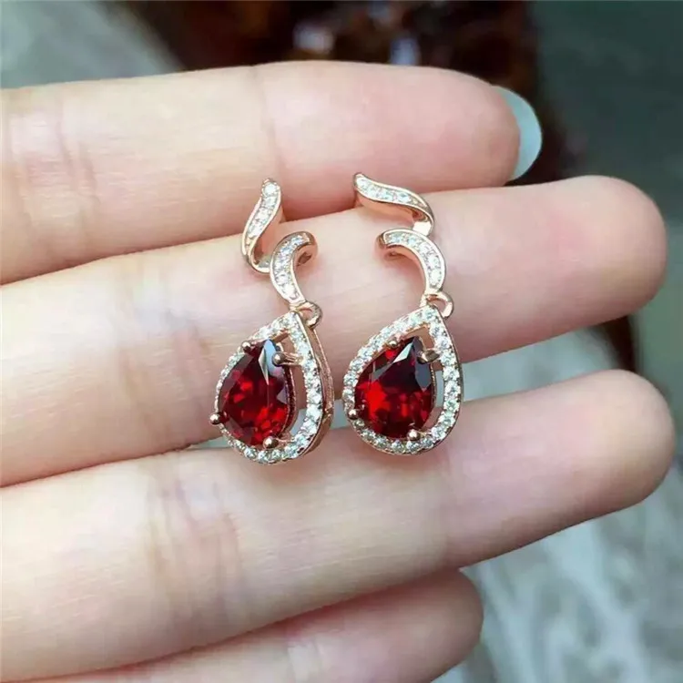 

KJJEAXCMY fine jewelry 925 Pure silver inlaid with natural water drop garnet female ear nail jewelry