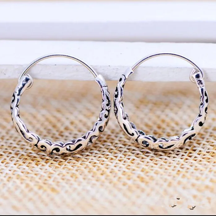 

KJJEAXCMY fine jewelry S925 Sterling Silver retro Thai silver hollowed Round Earrings, ladies ear studs, ear studs.